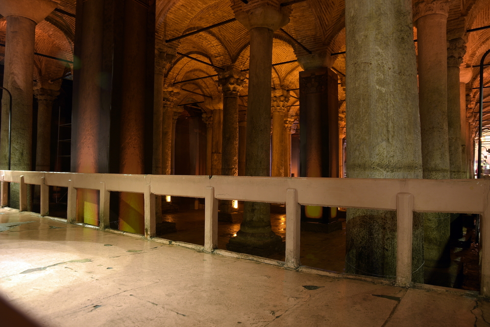 Wooden walking platforms above water inside the Basilica Cistern in Istanbul