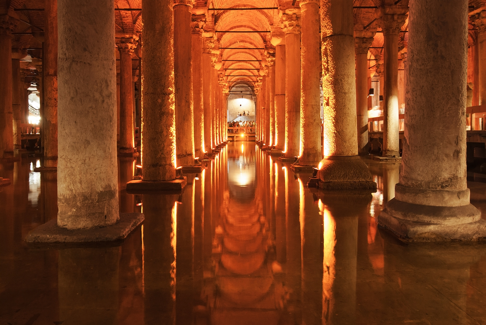 Basilica Cistern interior walkway with wooden platforms and water reflections in Istanbul